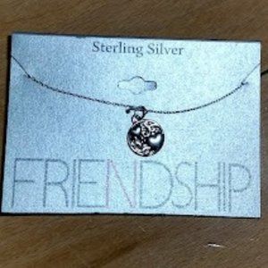 Sterling silver heart pendant necklace.